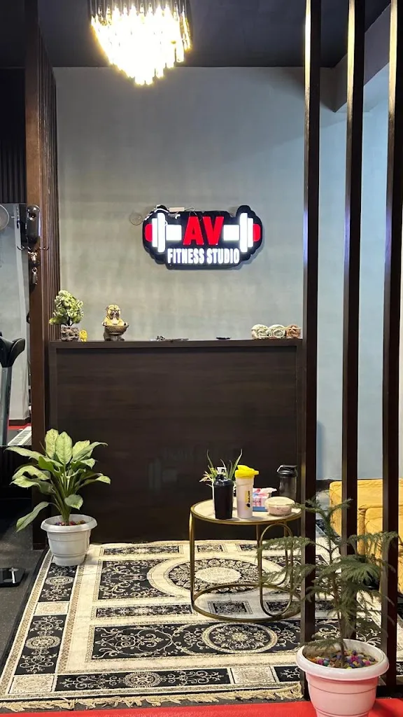 The AV Fitness Studio sign above the reception desk, DLF Phase IV, Sector 27.